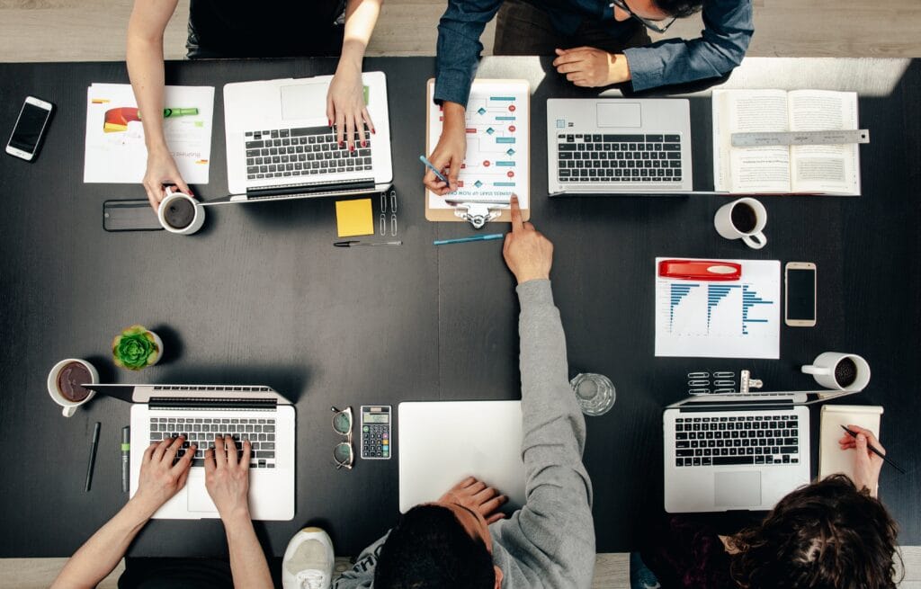 workers-group-meeting-flatlay