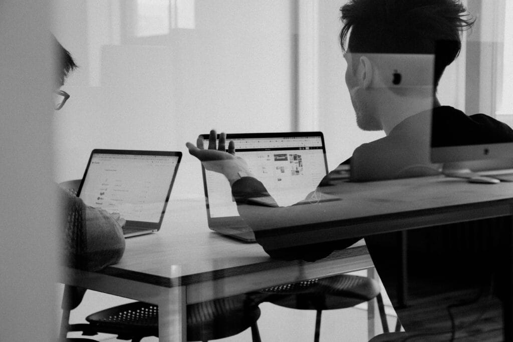 two-man-working-on-laptop